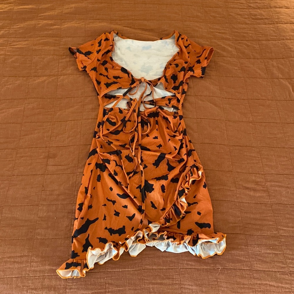 Orange and black ruffled dress